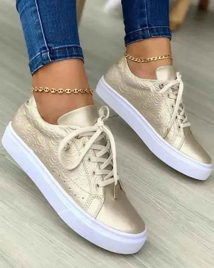 Chic sneakers with gold detail